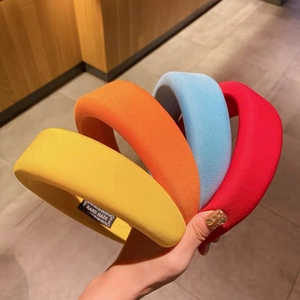Thick padded fabric headbands in candy colors including yellow, orange, blue and red