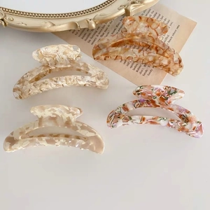 Elegante set de pinzas para el cabello de acetato marrón con varios patrones de mármol