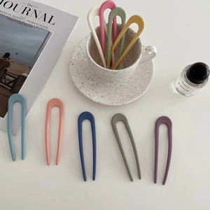 Minimalist U-shaped hair fork pins in colorful matte finish for elegant styling