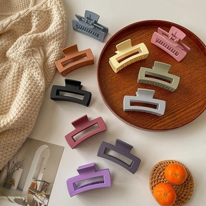 Matte candy-colored hollow hair claws in various spring colors for women's hair styling