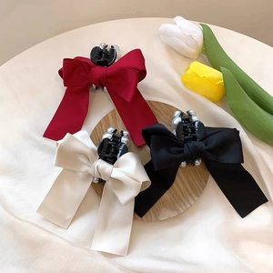 Three-piece set of elegant bow hair claws with white pearl accents in red white and black