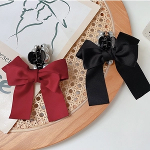 Elegant bow hair claw clips with pearls in wine red and black for women's hairstyling