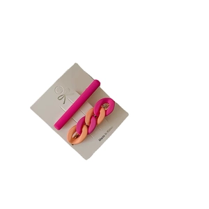 Two-piece candy color chain hair clips on display card with matte magenta finish