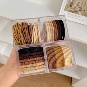 Lot d'élastiques à cheveux en boîte acrylique tons noir marron terreux