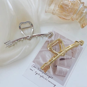 Pinces à cheveux flèche de Cupidon élégantes en or et argent pour chignons de femmes