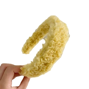 Soft light yellow lamb wool headband featuring a wide plush design for autumn and winter