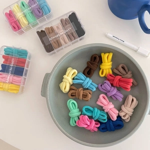 Set of 25 colorful seamless high elasticity hair ties in macaron candy tones with storage box