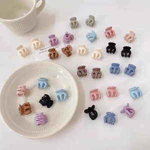 Set of multi-color mini hair claws in matte finish for styling bangs and side hair