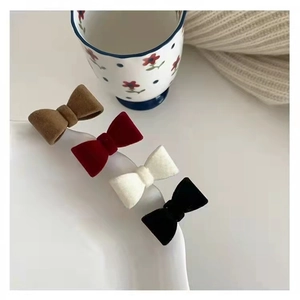 Elegant velvet bow hair clips in brown red white and black for sweet autumn winter style