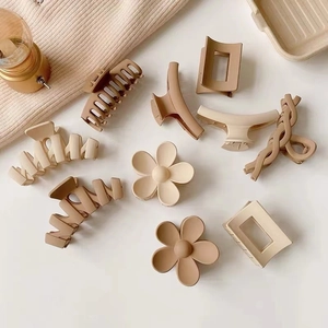 Minimalist matte coffee series hair claws in assorted cross hollow and flower shapes