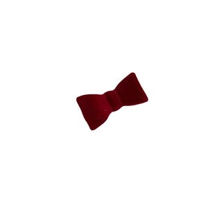 Classic deep red velvet bow hair clip with plush texture for elegant styling