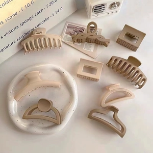 Neutral tones matte claw clips collection in cross and hollow designs for thick hair