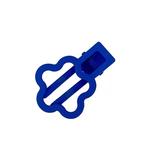 Blue flower hair clip in matte finish with duckbill clamp for women's hair styling