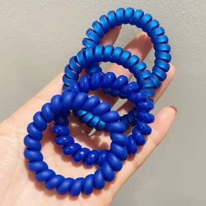 Lot de quatre élastiques à cheveux spirale bleu cobalt, finitions mates et brillantes