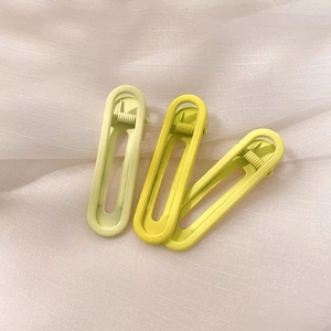 Set of 3 gradient candy color matte hair clips in light green and yellow on white tulle