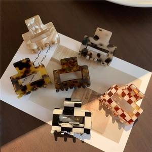 Detailed set of six square acetate hair claws featuring leopard and checkered patterns