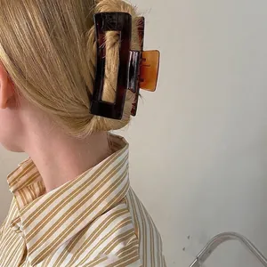 Large 12.5cm amber tortoise shell hair claw clip for thick hair styling in daily use