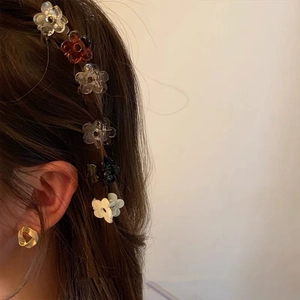 Mini floral hair claw clips for women in multi-color acrylic for elegant hair styling