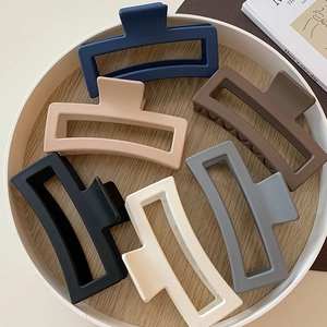 Detailed set of six 12cm matte rectangular hair claws in various neutral colors