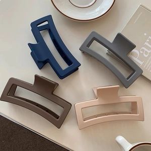 Set of four large 12cm matte hair claw clips for thick hair in navy, grey, coffee and beige