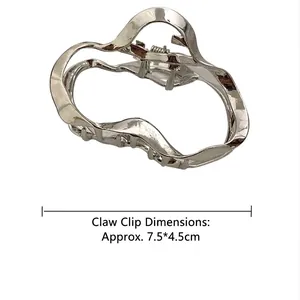 Modern irregular wave silver hair claw clip for women, size 7.5x4.5cm, sleek metal design