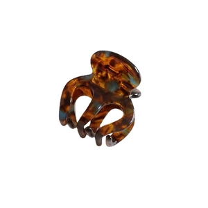 Tortoiseshell leopard print hair claw clip for high ponytail on white background
