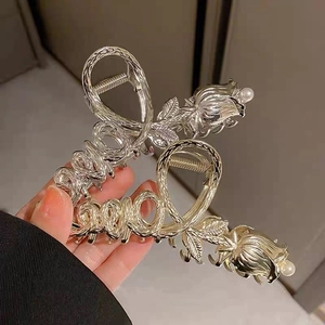 Elegant silver metal rose hair claw clip with pearls and LOVE lettering design