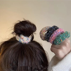 Colorful plush knit hair scrunchies in four sweet autumn-winter styles for women