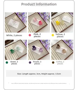 Detail view of 3cm mini pumpkin hair claws in jelly colors showing resin material and size