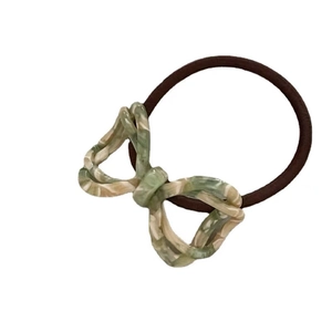 Acetate bow hair tie with green marble texture pattern on high elastic rubber band