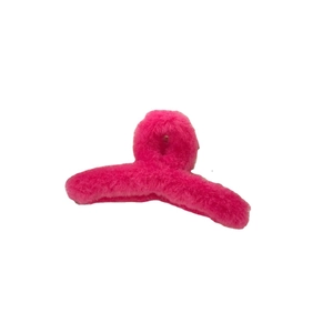 Faux fur hair claw clip in vibrant hot pink for autumn and winter hairstyling