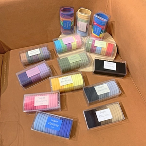 High elasticity hair ties set in clear rectangular boxes with multi-color nylon bands