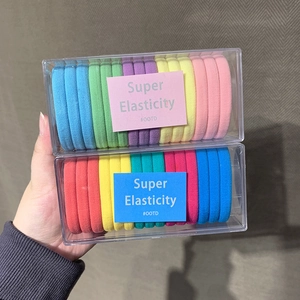 Close-up of dual-box set colorful high-elastic hair ties in macaron and bright tones