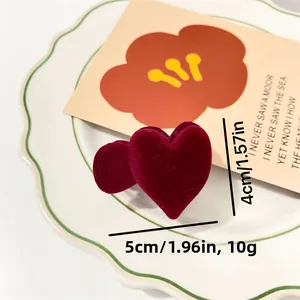 Close-up of a velvet heart hair claw clip set with 5cm dimensions and 10g weight