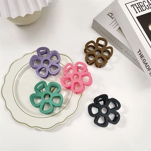 Five-piece set of matte floral hair claw clips in purple pink green brown and black