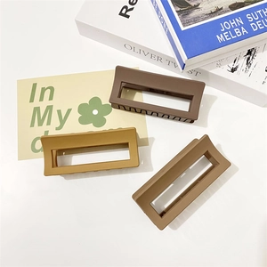 Three-piece set of matte geometric rectangular hair claws in earth-toned colors for women