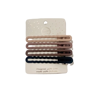 Set of four matte wave hair clips in beige pink brown and navy blue on card