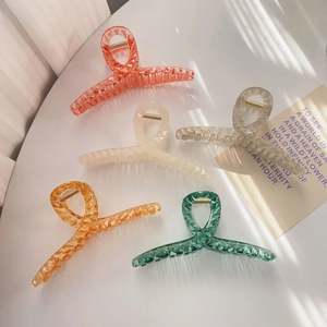 Translucent shark hair claws with geometric diamond cut design in five elegant colors