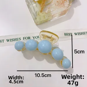 Detailed size view of acrylic pearl claw clip with dimensions 10.5cm by 5cm in light blue