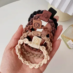 Five-color high-elastic braided hair ties with smiley face leather tag for women