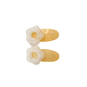 Pair of cream yellow flower hair clips for women and kids on white background