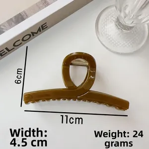 Dettagli della pinza per capelli color caramello da 11cm con dimensioni e peso