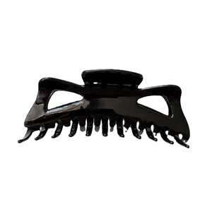 Pince à cheveux jumbo noir brillant pour cheveux épais avec un style minimaliste élégant
