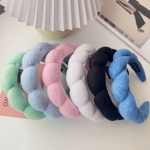 Plush padded braided headbands in six pastel colors for a stylish high skull top look