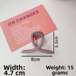 Detail view of matte purple hair claw clip with dimensions 8cm by 5.5cm for women