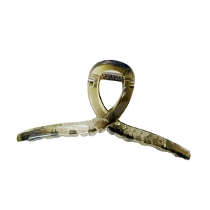 Large tortoiseshell hair claw clip with elegant marble pattern for women hairstyle