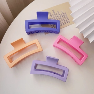 Set of four 13cm matte square shark clips in purple and pink for thick hair styling