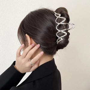 Elegant large silver wave hair claw clip for women with a polished metallic finish