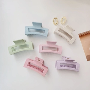 Set of six colorful matte square hair claw clips in macaron tones for women styling