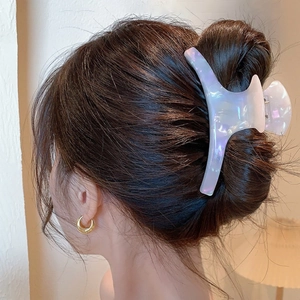 Pearlescent white acetate large claw clip for thick hair styling and elegant updo look